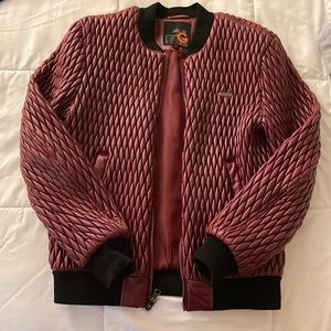Burgundy bomber jackets. Good condition.